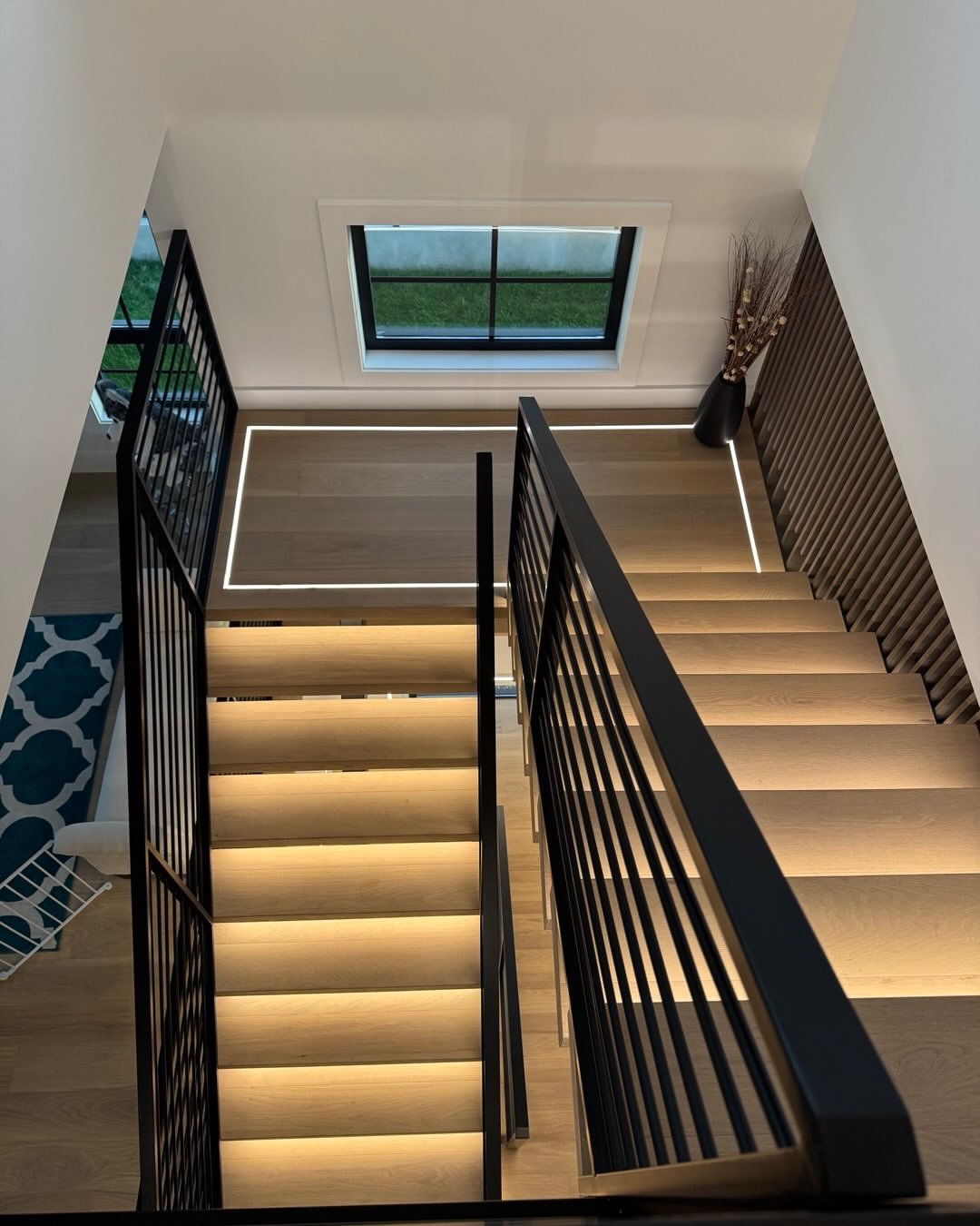Top view of illuminated staircase landing