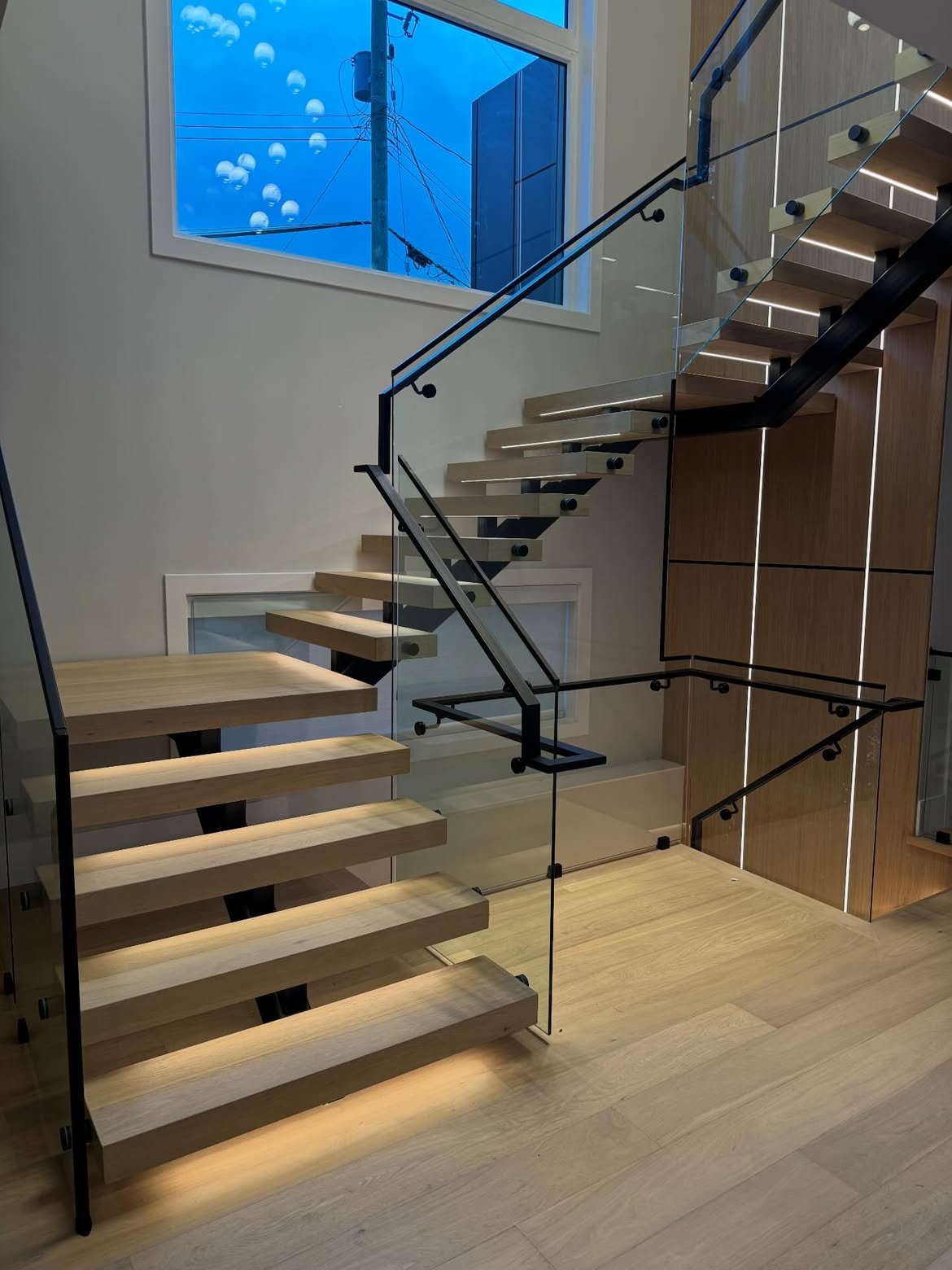 Minimal staircase with glass railing
